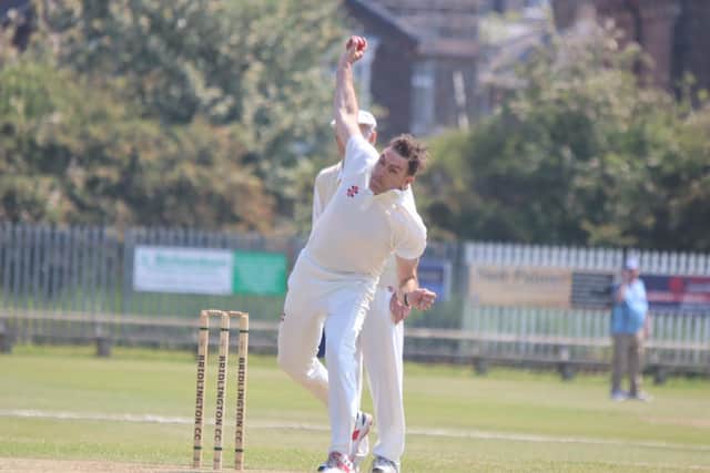 Bridlington 3rds in bowling action.