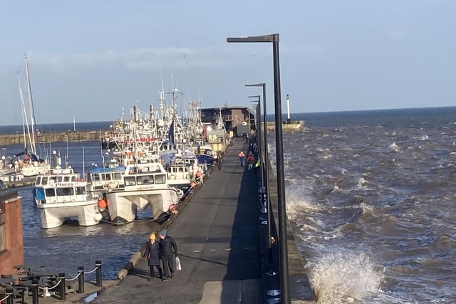 Couples were taking a romantic walk along the Bridlington Harbour viewpoint even though winds were blustery.