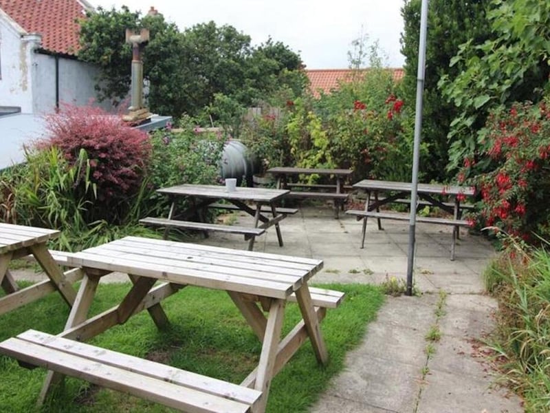 An attractive beer garden lies to the rear of the pub.