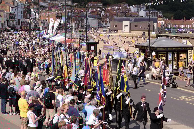 The standard bearers march by