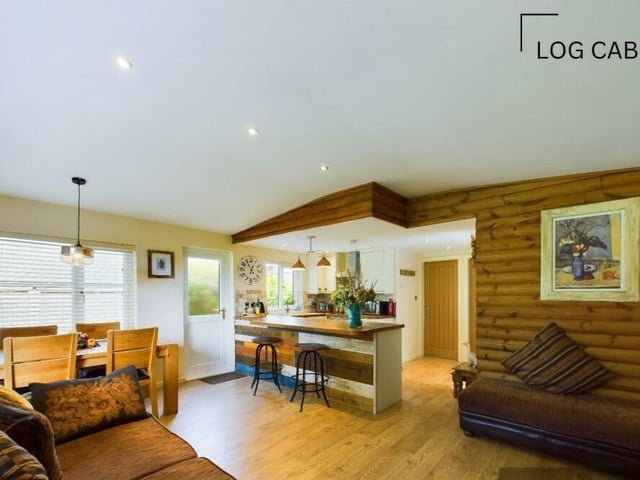 The main living area inside the log cabin.