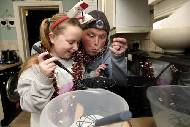 Lily and Dad Graham Porter making dinner