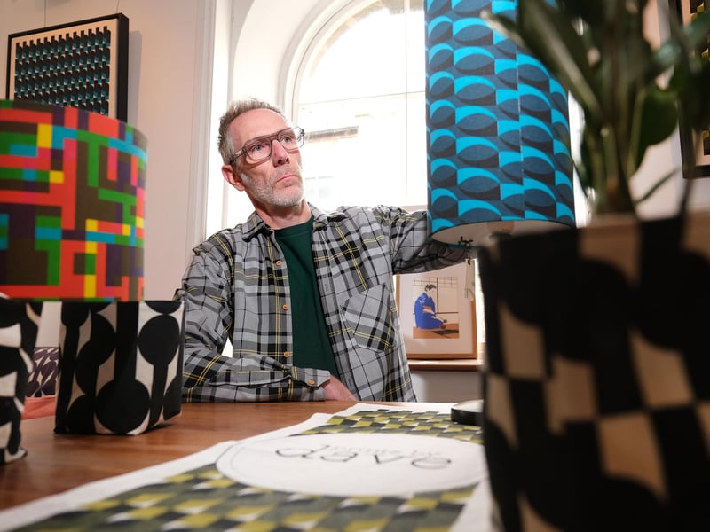 Printmaker Dave Royston with his work.