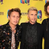 Mark Owen, Gary Barlow, and Howard Donald of Take That, who have announced a huge UK arena tour