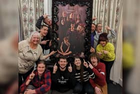 The cast of Scarborough Theatre Company's production of the Addams Family with one of Tim Youster's pictures