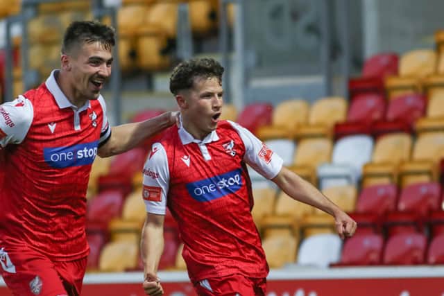 Will Thornton, left, congratulates Brad Plant on putting Boro 1-0 up against Guisborough in last season's NRCFA Senior Cup final