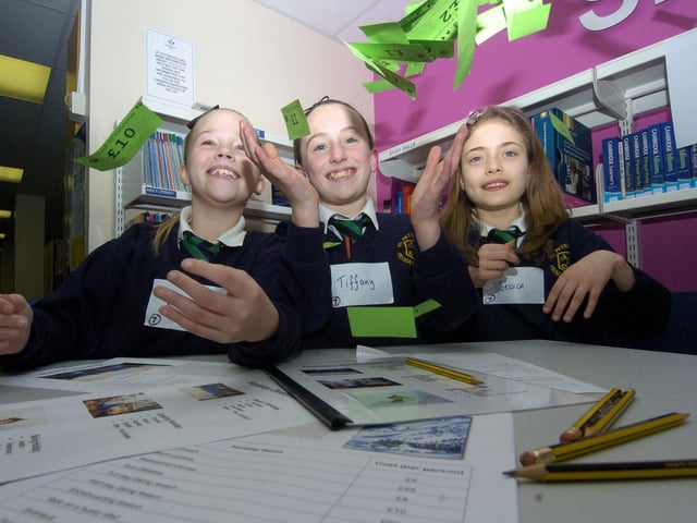 Pupils take part in a holiday booking maths challenge at the maths fair at Yorkshire Coast College.