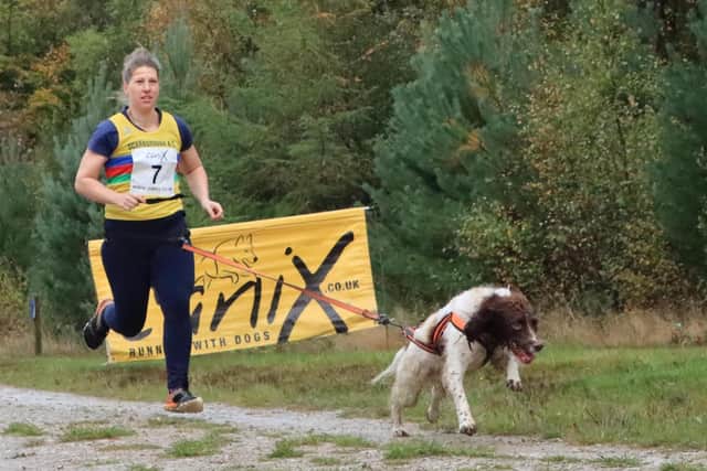 Scarborough Athletic Club's Jenna Wheatman competes in the Canicross event at Dalby Forest