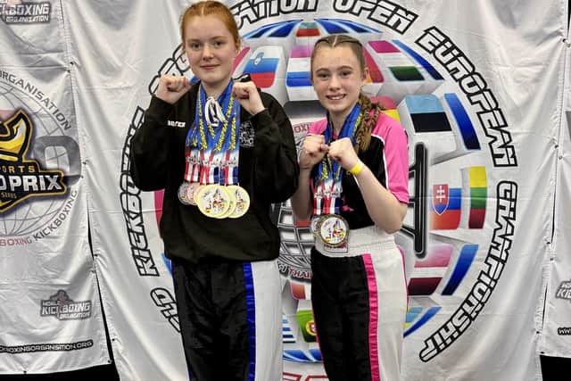 Left, Sarah Dicks, and Typhon teammate Limerick Goodwin show off their medals earned at the WKO European Championship.