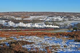 A steam train on the snow-covered North York Moors. picture: John Hunt.