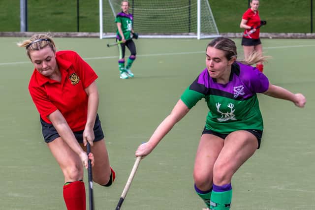 Danby's Erin Hodgson looks to keep the ball away from a Sunderland Broom player.