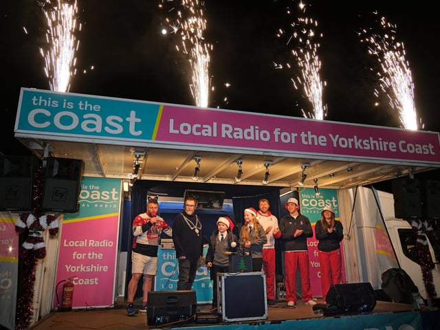 Christmas lights switch on.