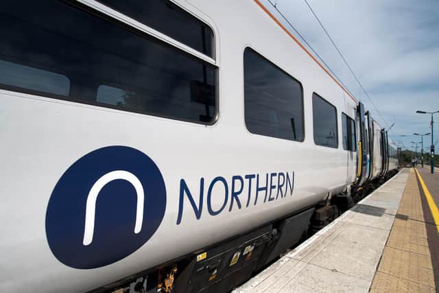 A Northern train waits in the station