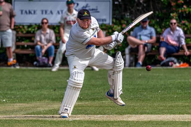 Kieran Purvis hammers a drive into the offside during his 56no. Photo by Brian Murfield