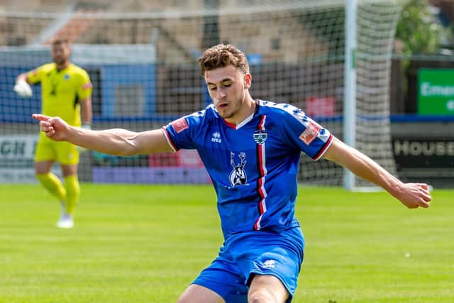 Priestley Griffiths on the ball for the home team.