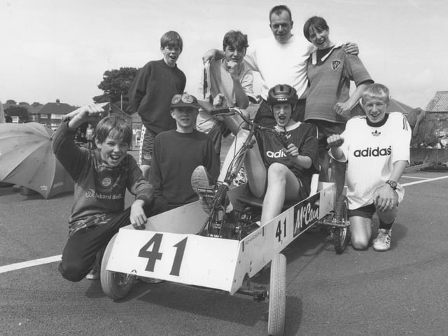 At the National Scout Car Races taking place on Burniston Road Car Park in July 1997 is car 41, Lungbuster, run by the scouts of the 49th Scarborough (Eastfield) division. From left Drew MCoubrey, Sean Dodsworth, Daniel Manning, Mike Pennock, team mananger Dennis Hilton, Michale Pidd, Michael Atkin, and driver Lee Hardcastle.