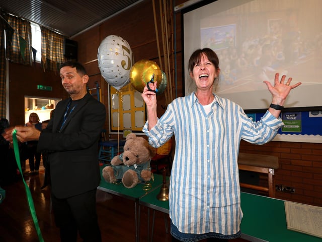 Newly retired teacher Joanne Hartley cutting the ribbon