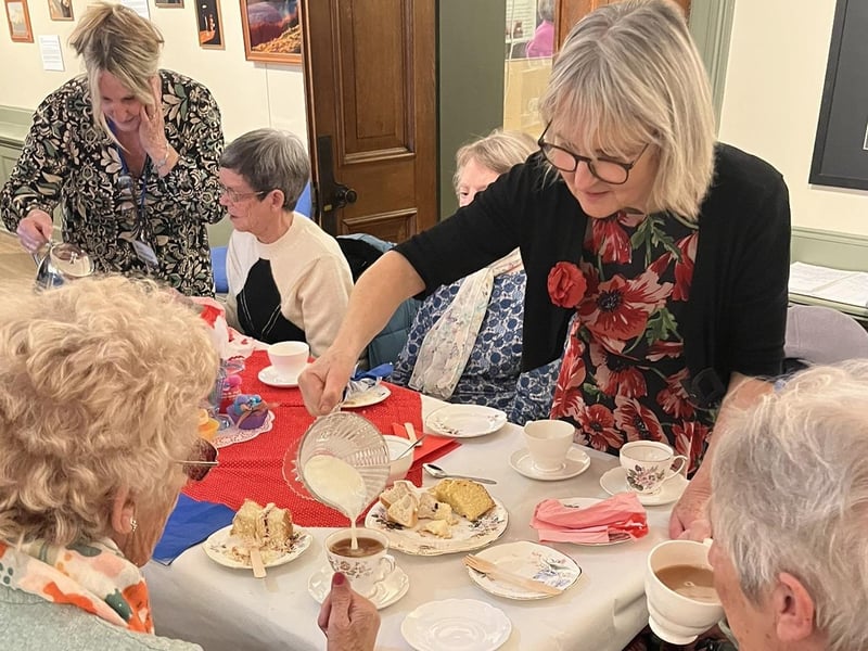 Helen Berry pours the tea!