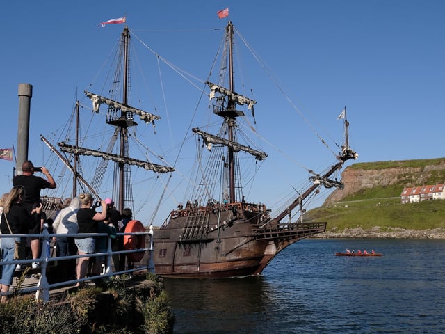 Cameras click as Galeón Andalucía arrives.