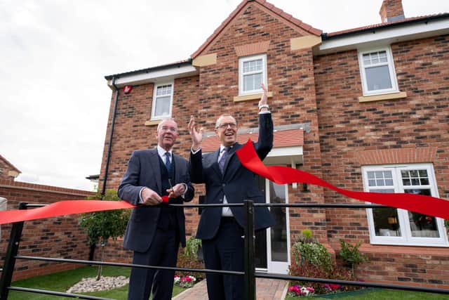 DSC02474 (L-R) Chair of Parish Council Andrew McCormack and Harron Homes Group Managing Director James Poynor