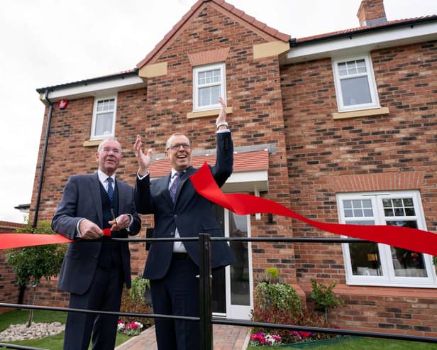 DSC02474 (L-R) Chair of Parish Council Andrew McCormack and Harron Homes Group Managing Director James Poynor