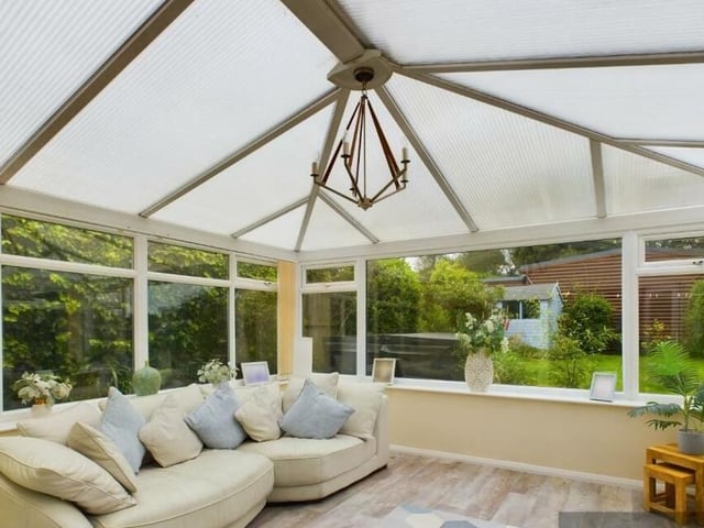The conservatory provides yet more space, and has views over the garden.