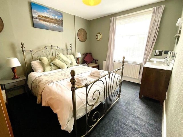 One of the double bedrooms, which are currently arranged to accommodate 12 people.
