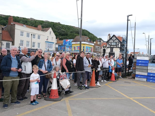 Visitors gather to see the vessel.