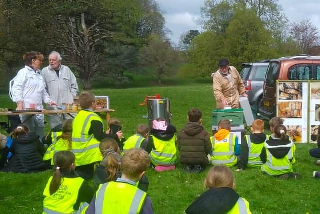 Scarborough and District Beekeepers' Association chat to youngsters.