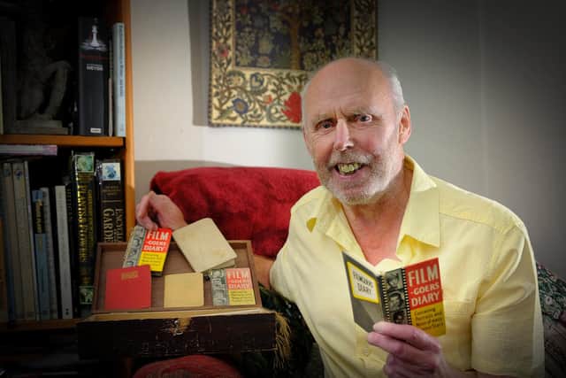 Martin Dove with his collection of diaries . pic Richard Ponter