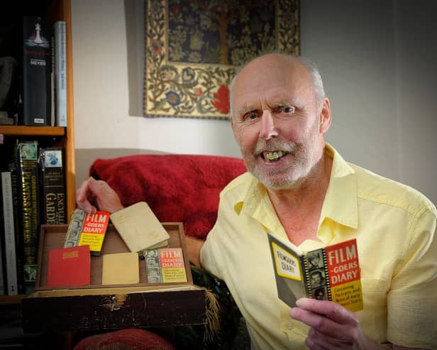 Martin Dove with his collection of diaries . pic Richard Ponter