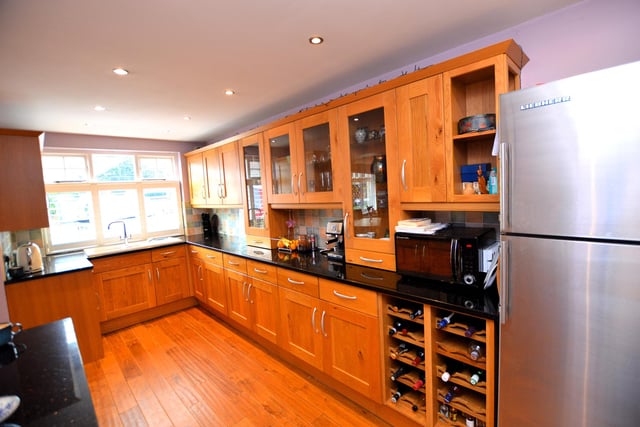 The well equipped kitchen has a feature Aga stove.