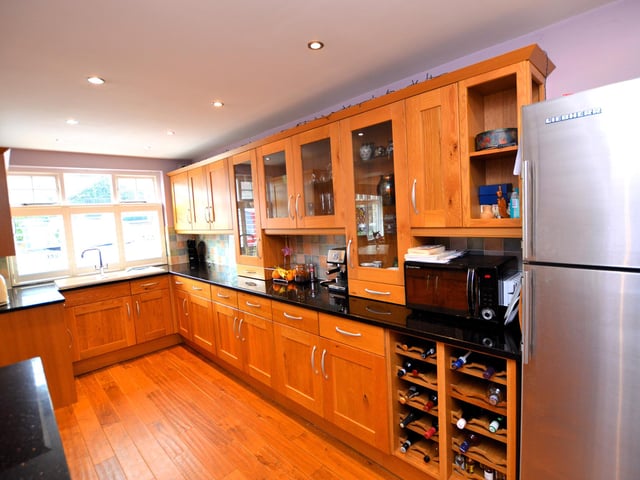 The well equipped kitchen has a feature Aga stove.