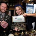 Furbellow and Co sell lobster bottle openers in aid of Whitby's Lobster Hatchery. Pictured - Mark and Ceri promote the charity bottle openers. picture: Richard Ponter