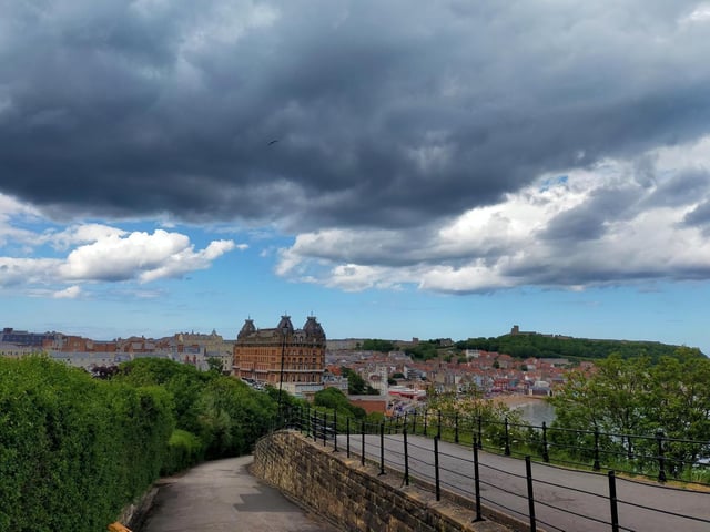 Dark clouds loom over the Grand Hotel, by Peter Robinson.