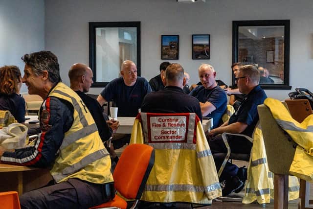 Firefighters taking a well deserved break.
