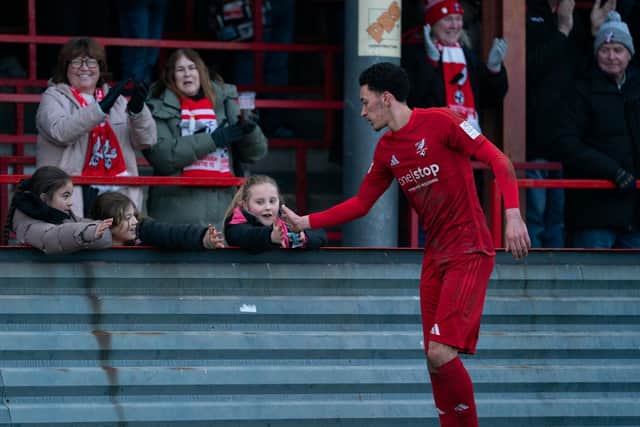 Rio Allan thanks the young Boro fans. Photo by Wandering Photography