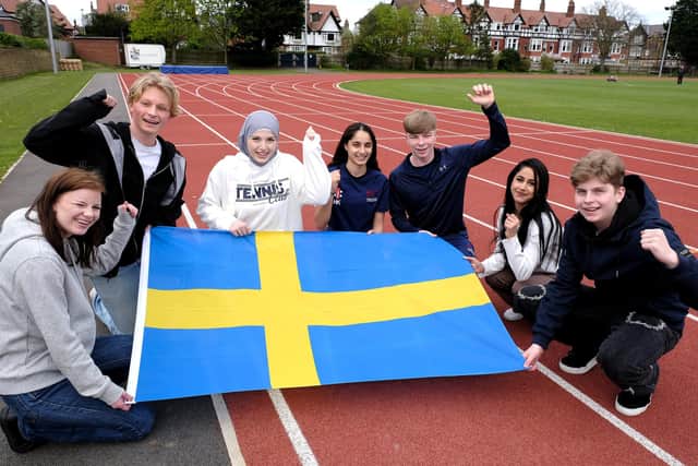 Swedish students visit Scarborough College....flying the flag at the Sports track