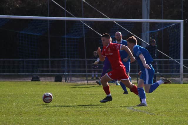 Ben Farrar back in action for Brid Town at Hallam after being recalled by York City from Whitby. Photo by EC Media