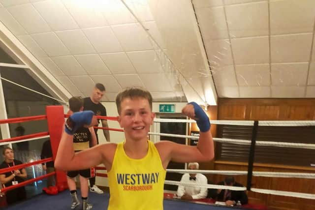Westway Boxing Club's Preston Hirstle celebrates his win at Brighouse.
