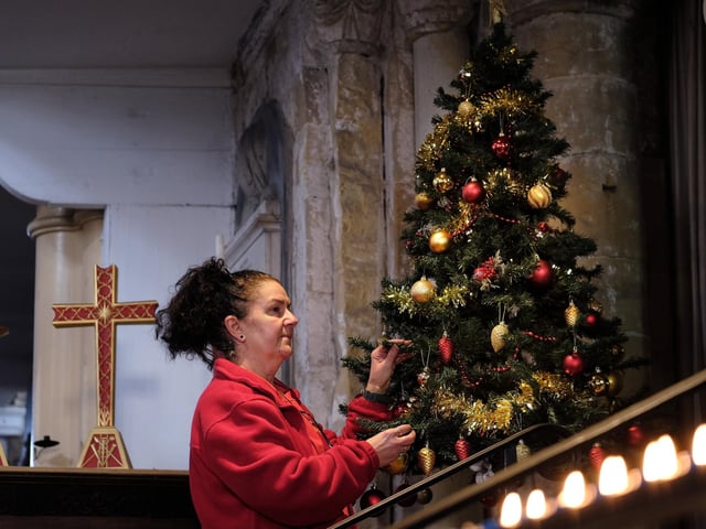 Nicola Hutchinson with some of the festive trees..
picture: Richard Ponter, 225201b