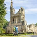 Two cyclists at Byland Abbey, one of the locations on the Hearts and Minds route.
Russell Barton