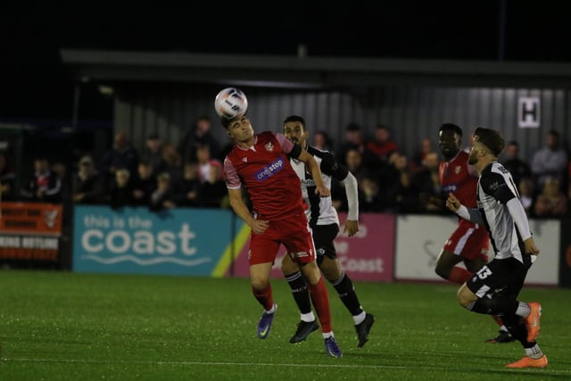 Dom Tear wins a header for Boro in the 3-2 victory at home to Chorley