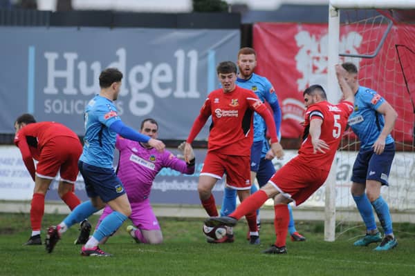 James Williamson trying to get a shot at goal from a Bridlington Town corner. PHOTOS BY DOM TAYLOR