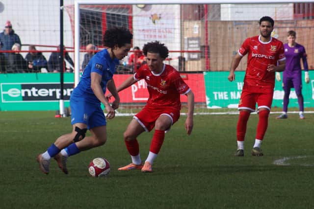 Hamza Hamdosh looks to close down a Blyth Town player. Photo by ECmedia