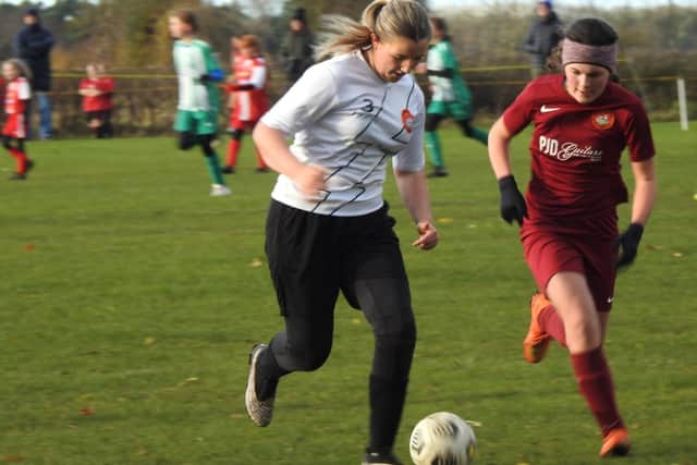 Scarborough Ladies U13s, white kit, take on Scarborough Ladies Lionesses.