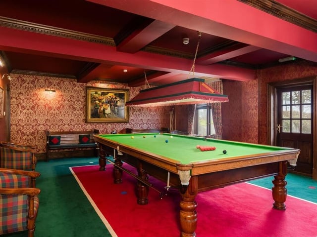The billiard room has a door to outside.