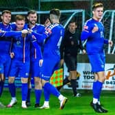 Aaron Haswell, third from left, is congratulated after scoring his first goal in the 3-0 home win against Bamber Bridge PHOTO BY BRIAN MURFIELD