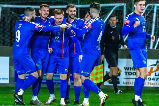 Aaron Haswell, third from left, is congratulated after scoring his first goal in the 3-0 home win against Bamber Bridge PHOTO BY BRIAN MURFIELD