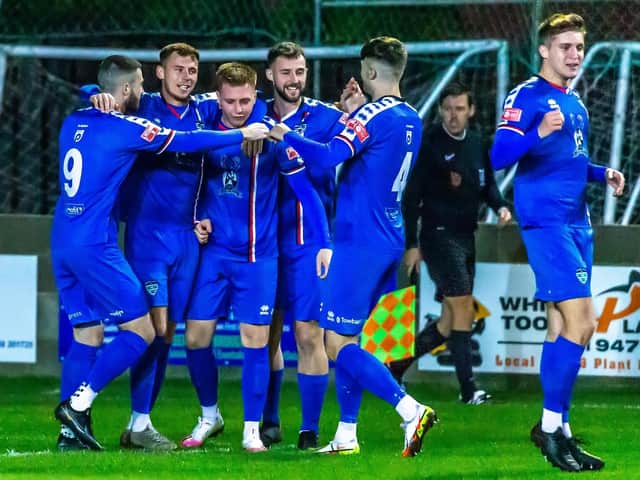 Aaron Haswell, third from left, is congratulated after scoring his first goal in the 3-0 home win against Bamber Bridge PHOTO BY BRIAN MURFIELD